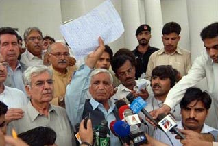 NWFP Minister Bashir Bilour with Swat Treaty Hasham Ahmed.